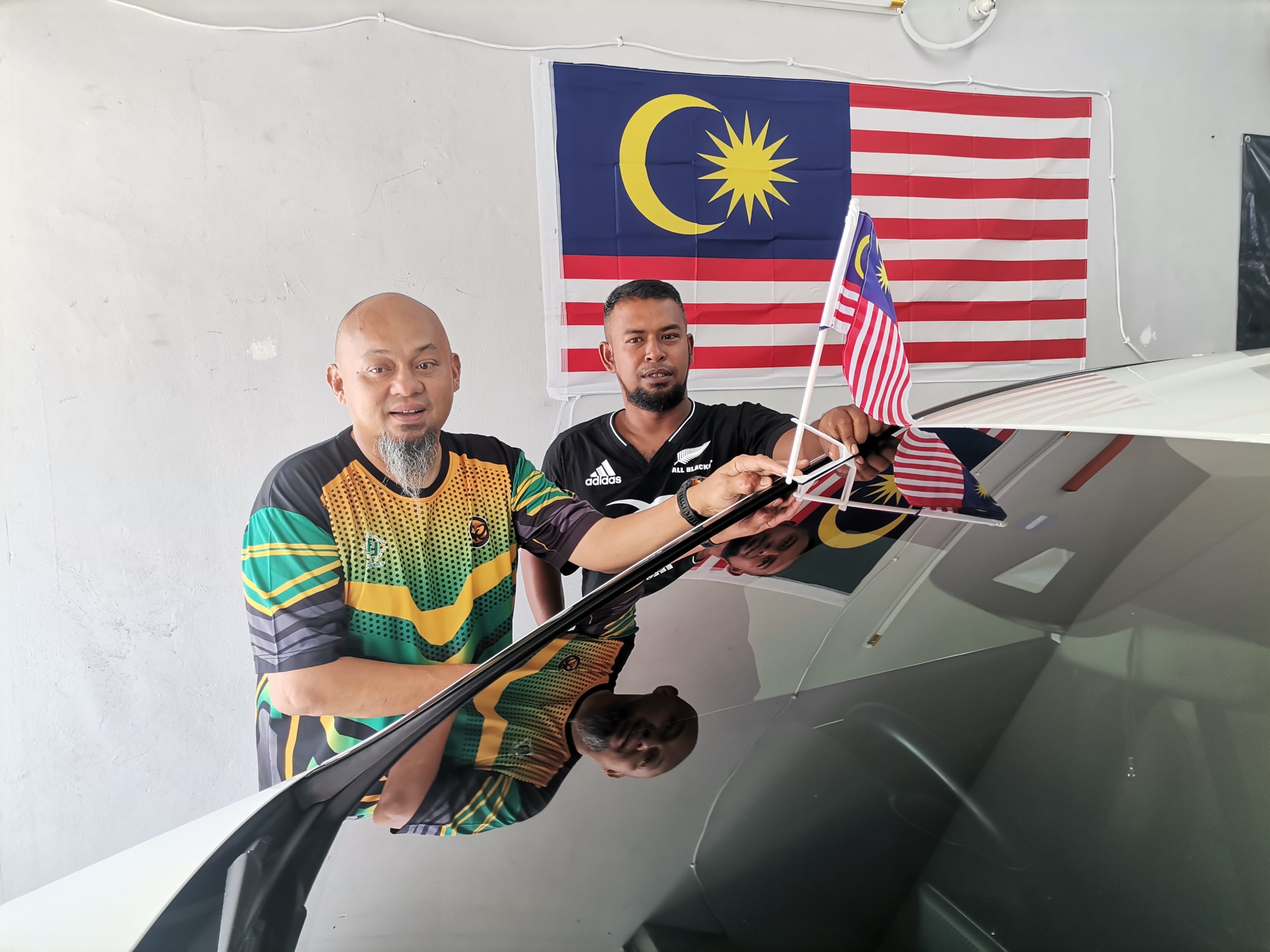 Cuci kereta dapat Jalur Gemilang percuma